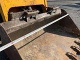 a measuring tape on the back of a bulldozer