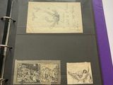 a purple binder with drawings on it and a pen in it
