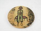 a picture of a painting on a plate on a table