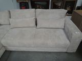 a couch that is sitting in the middle of a room