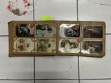 a picture of a box with pictures on it on a tiled floor