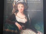 un livre avec la photo d'une femme en robe blanche