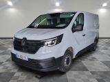 the white van is parked on a checkered floor in a room