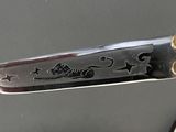 a knife and a pair of scissors on a table