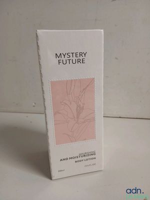 an image of a box of perfume sitting on top of a table