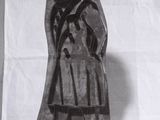 a black and white photo of a statue of a woman