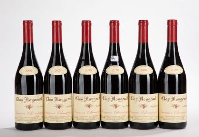 six bottles of red wine are lined up in a row