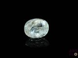 une image représentant un diamant bleu sur un fond noir