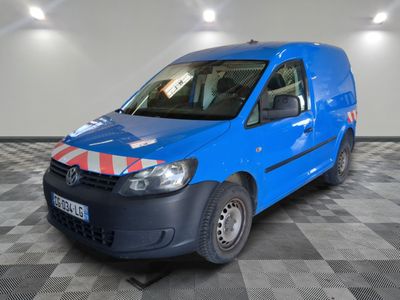 a blue van that is parked in a room