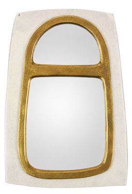 un miroir blanc et doré avec un cadre doré
