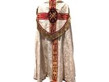 an image of a priest ' s robe with a cross on it
