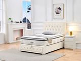 an image of a bedroom with a bed and a fireplace