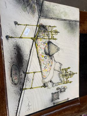 une photo d'un tableau représentant une souris accroché au mur
