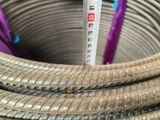 a close up of a hose with a thermometer in it
