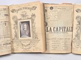 un livre ouvert sur lequel figurent la photo d'un homme et celle d'une femme