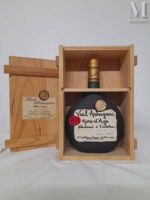 an image of a bottle of liquor in a wooden box