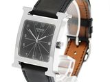 black leather strap on a watch with a square face