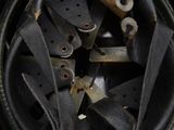 a close up view of a helmet with a lot of straps