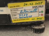 a label on the back of a car stating that it is parked