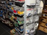 a display of various electronic devices in a store