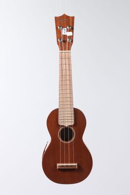 a close up of a wooden ukule on a white background