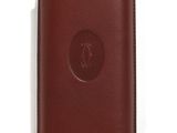 brown leather case for a cell phone on a white surface