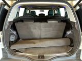 a trunk of a car with the back seats folded down