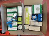 a box full of assorted items sitting on a table