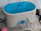 an image of a blue and white electric foot bath