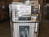 a metal cart with a stove inside of it in a warehouse