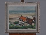 a picture of a painting of a house on a easel