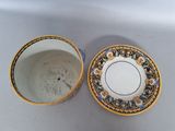 a small cup and saucer sitting on a table