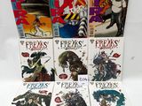 a bunch of comics sitting on top of each other on a table