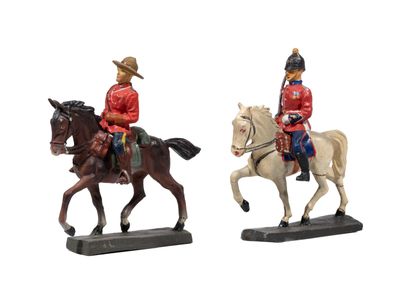 two figurines of men riding horses on a white background
