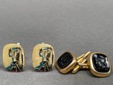 a pair of cufflinks and a pair of cufflinks with an image of a woman and a man
