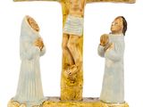 two figurines of jesus and mary on a cross