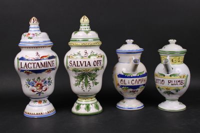 four different types of vases are shown on a black surface