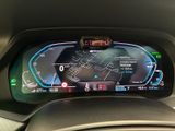 the dashboard of a car with a digital display on it