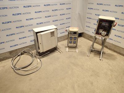 two machines that are sitting in a room