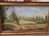 une peinture à l'huile d'un champ avec des arbres en arrière-plan