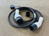 a black and white cord connected to a black and white power cord
