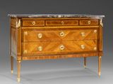 an antique chest of drawers with marble top