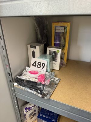 a shelf that has a lot of items on it