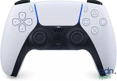 a close up of a video game controller on a white surface