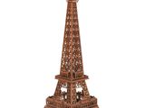 a close up of a wooden model of the eiffel tower