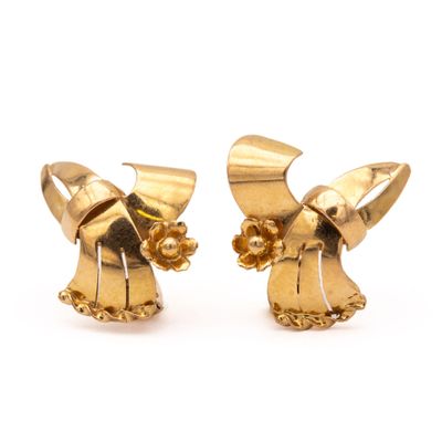 pair of gold tone angel earrings with pearls and chain