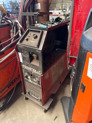 a machine that is sitting next to other machines