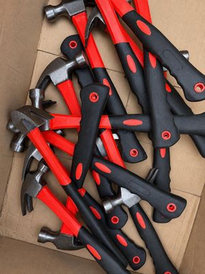 many different types of hammers in a cardboard box