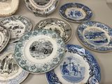 many plates that are sitting on a table