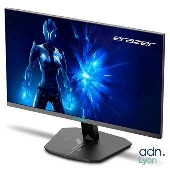 the computer monitor is displaying the image of a woman in a blue dress